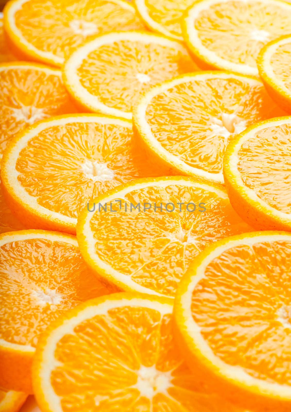 Abstract background with fresh juicy orange slices