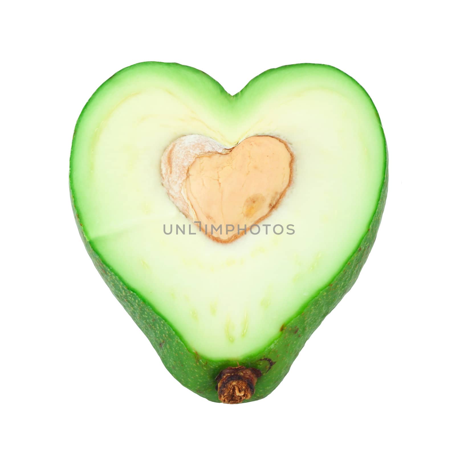 Cut avocado shaped like heart healthcare concept