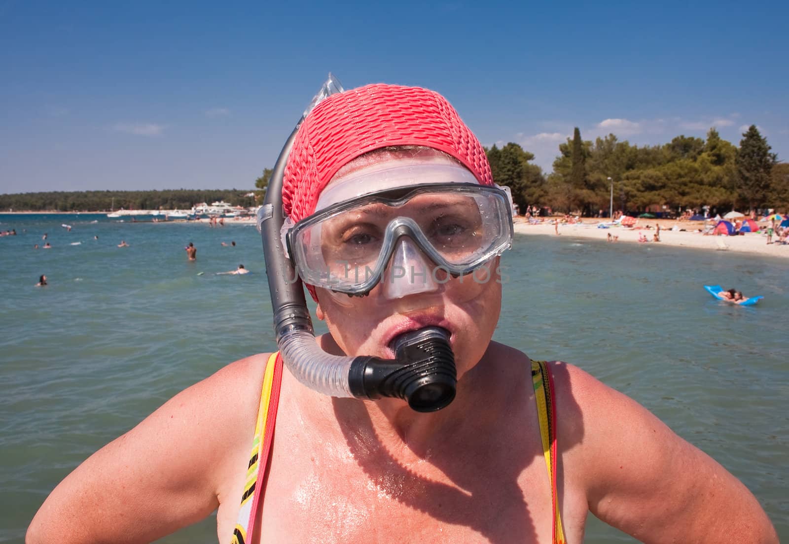 Man with a mask and snorkel for swimming