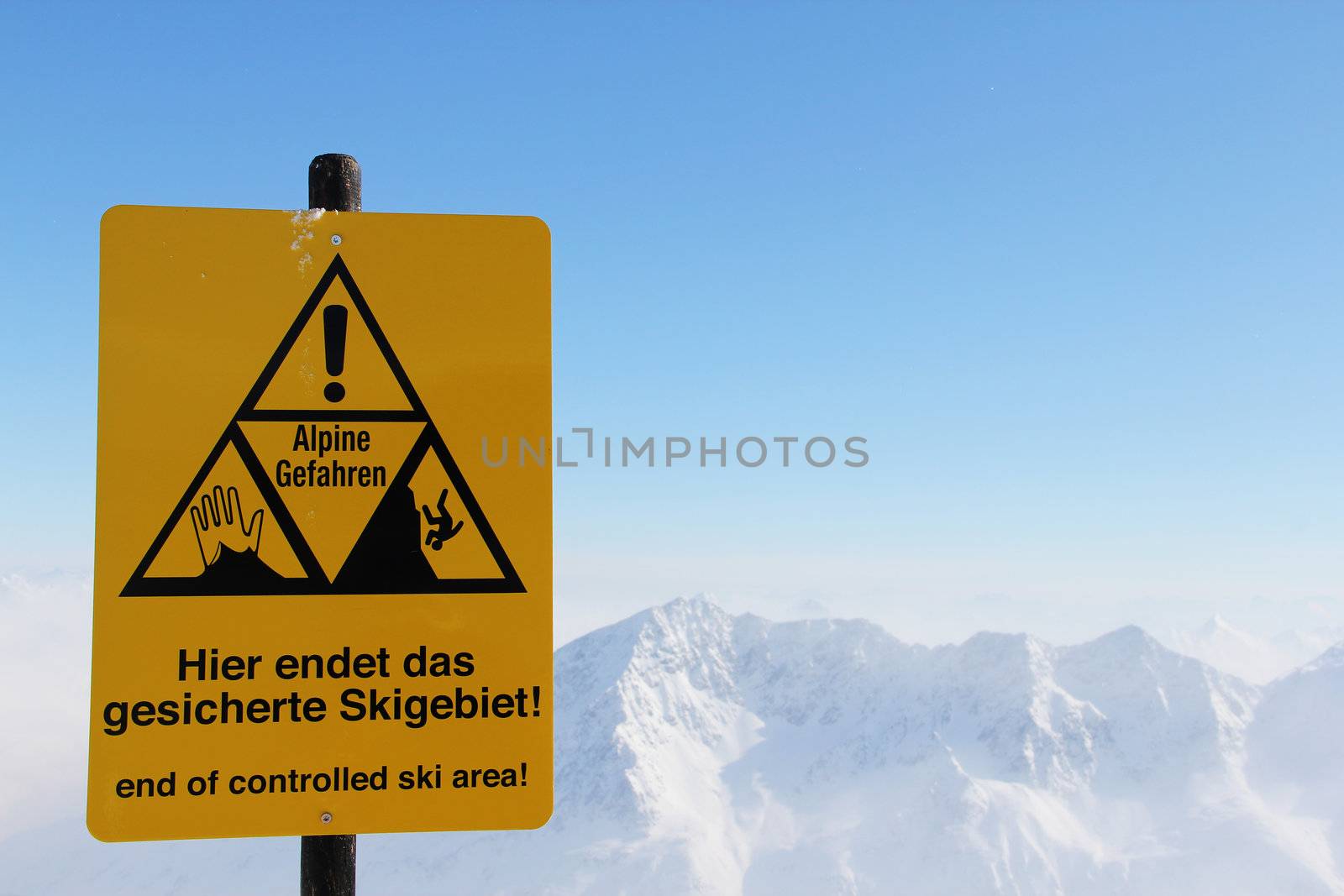 Danger sign in Mountains by destillat