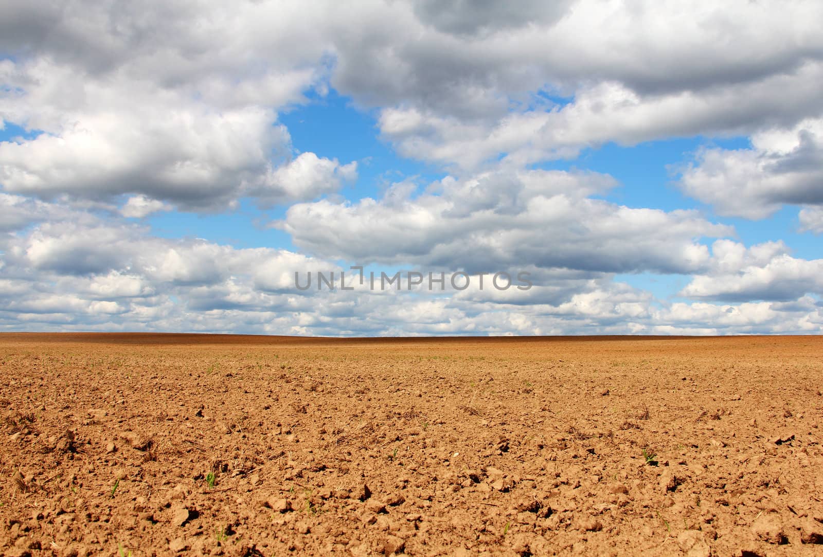 Empty land under blue cloudy sky beautiful landscape