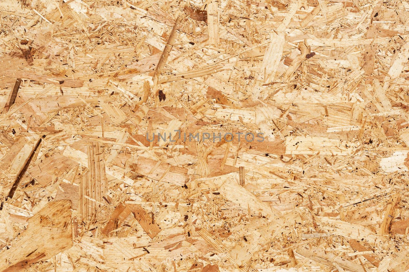 Close up of a recycled compressed wood chippings board