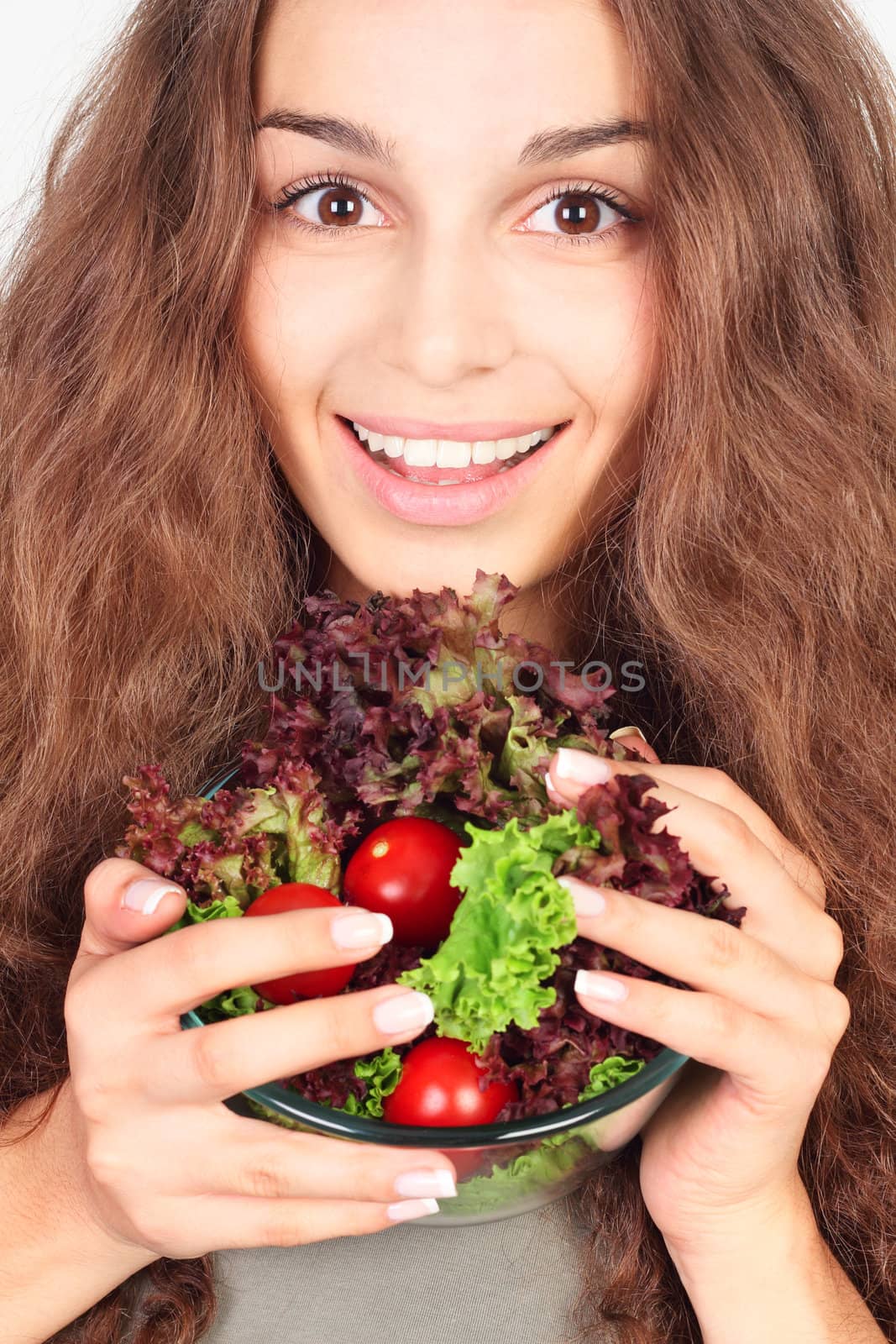 Woman with bowl of salad by destillat