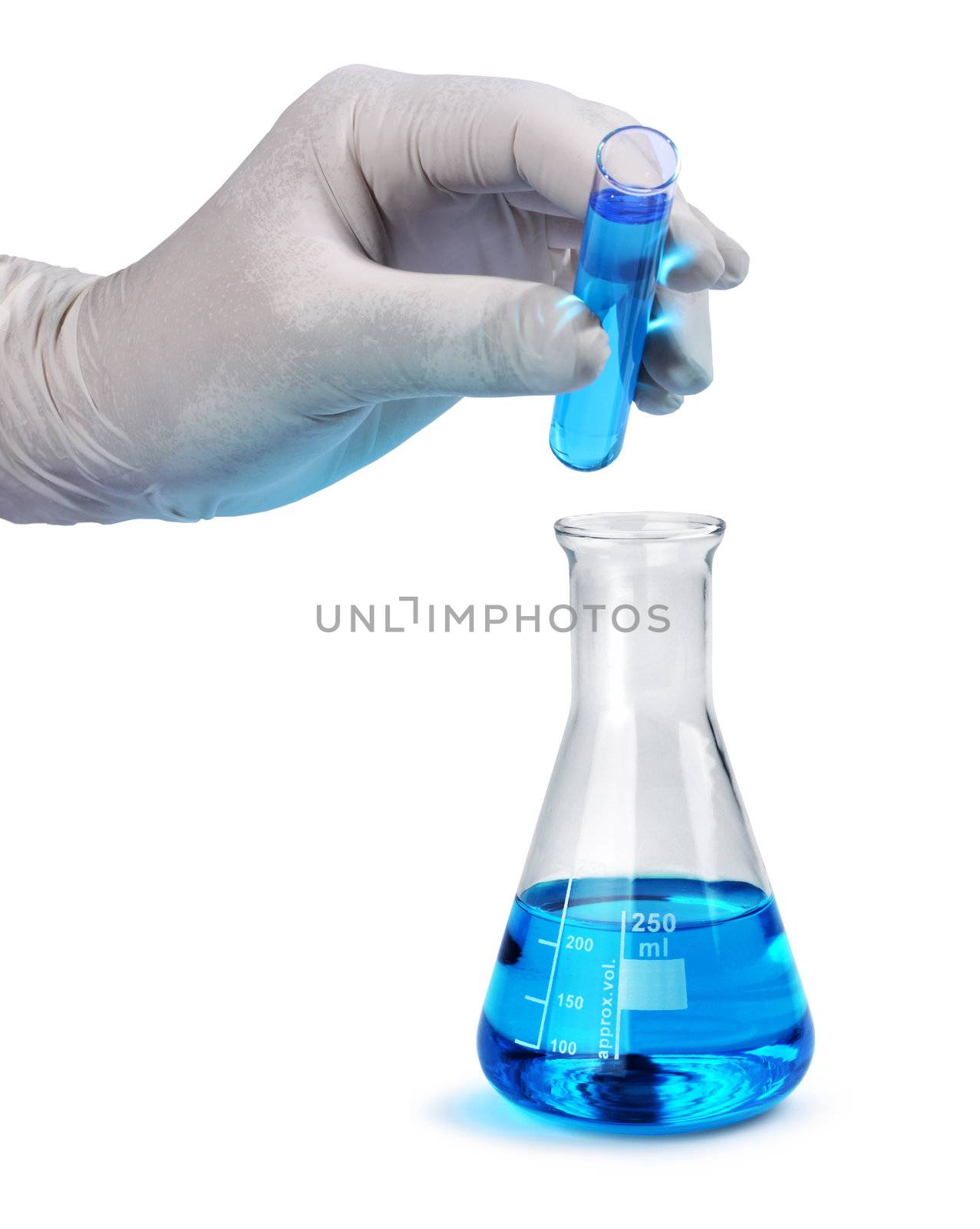 Gloved hand pours blue liquid sample by anterovium