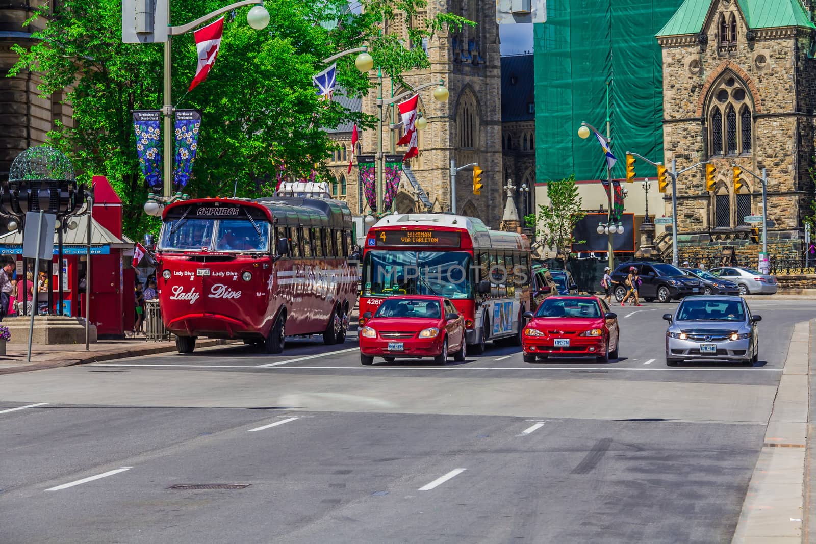 A street beside Parliament building with various vehicles Ottawa, Ontario, Canadavehicles; transport; street; road; 