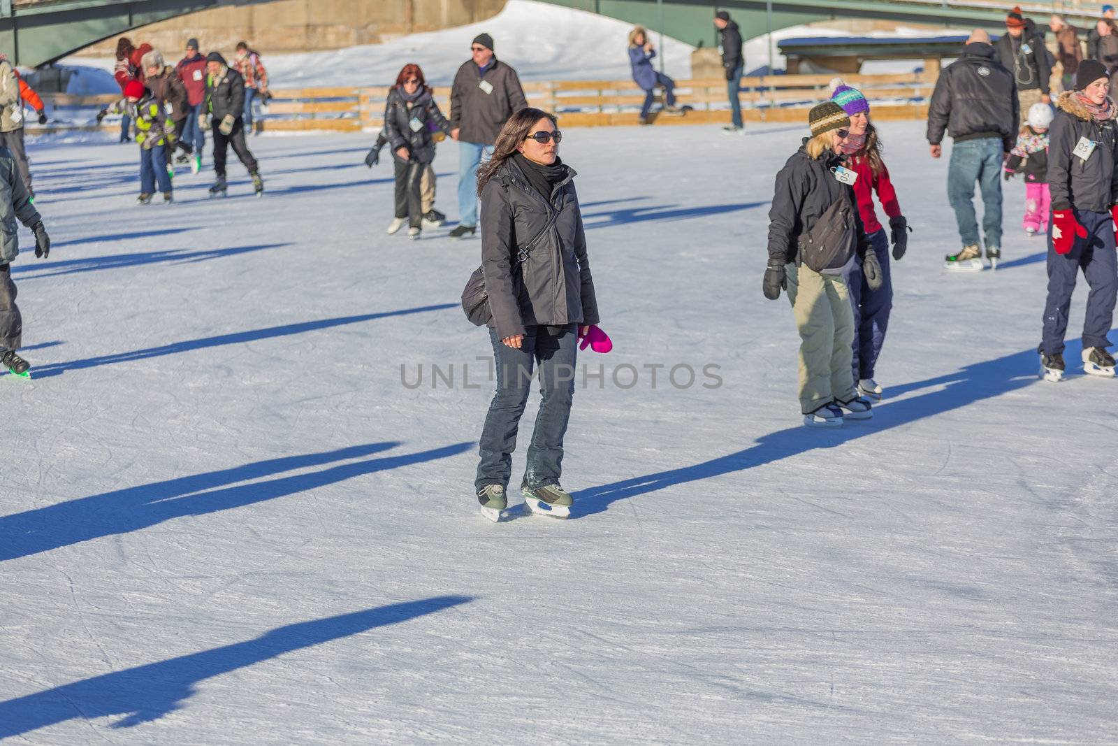  Ice skaters in a Skating Rink in Old Port of Montreal. Quebec, Canada.