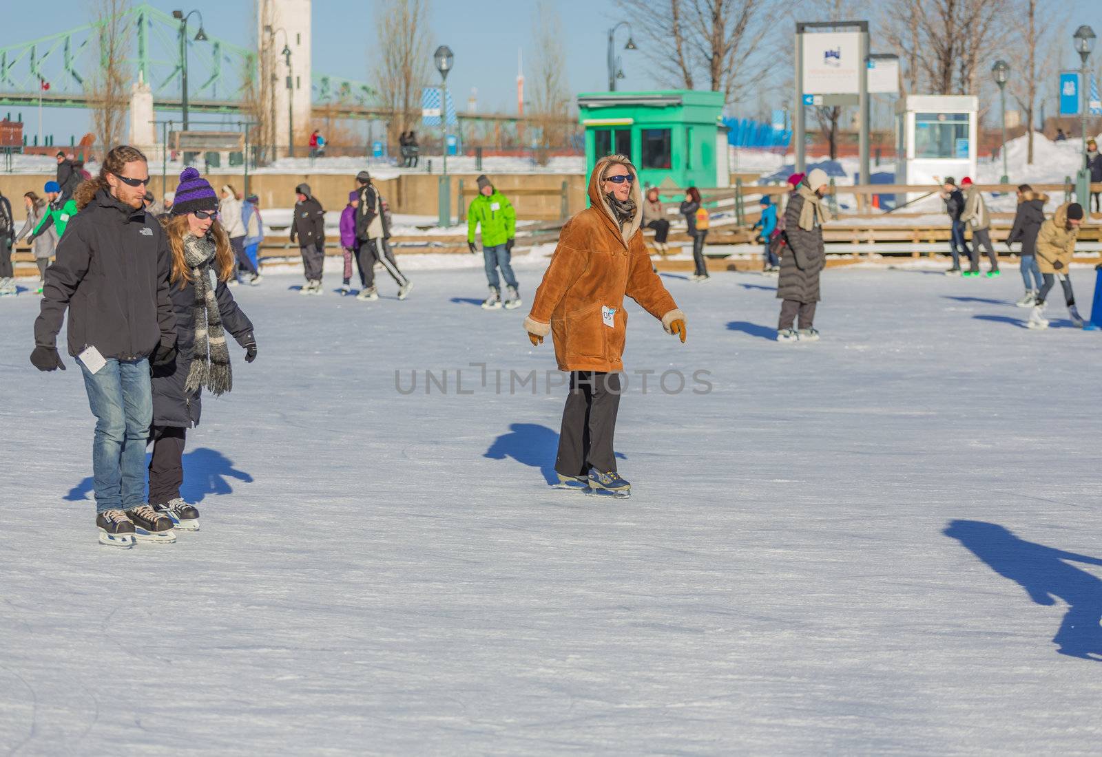 A woman ice skating by petkolophoto