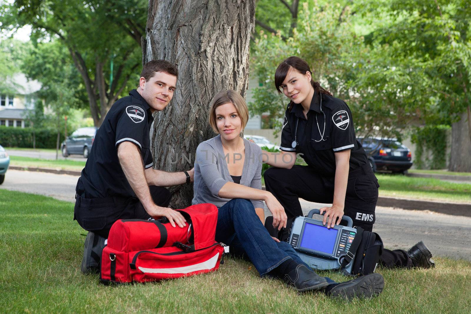 EMT Team with Patient by leaf