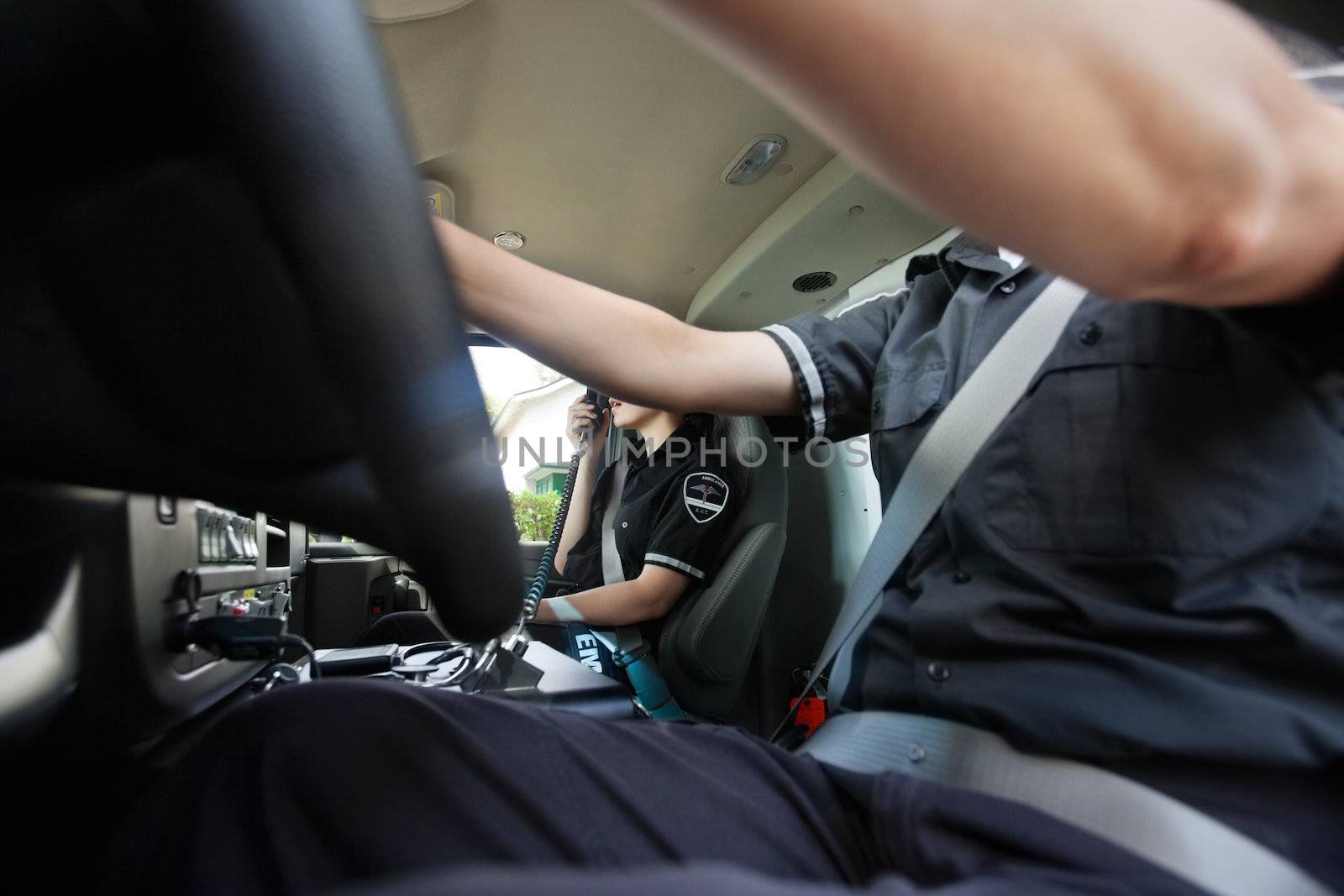 Annonymous view of two EMS workers driving an ambulance