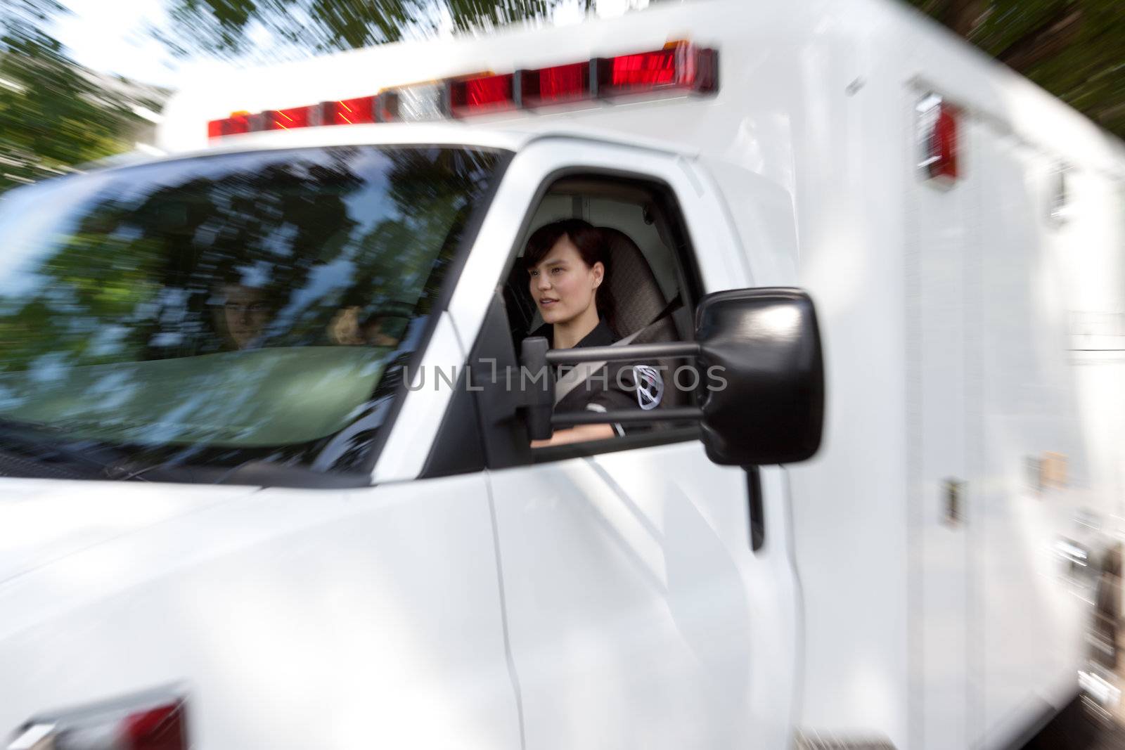 Motion blur of an ambulance speeding to accident