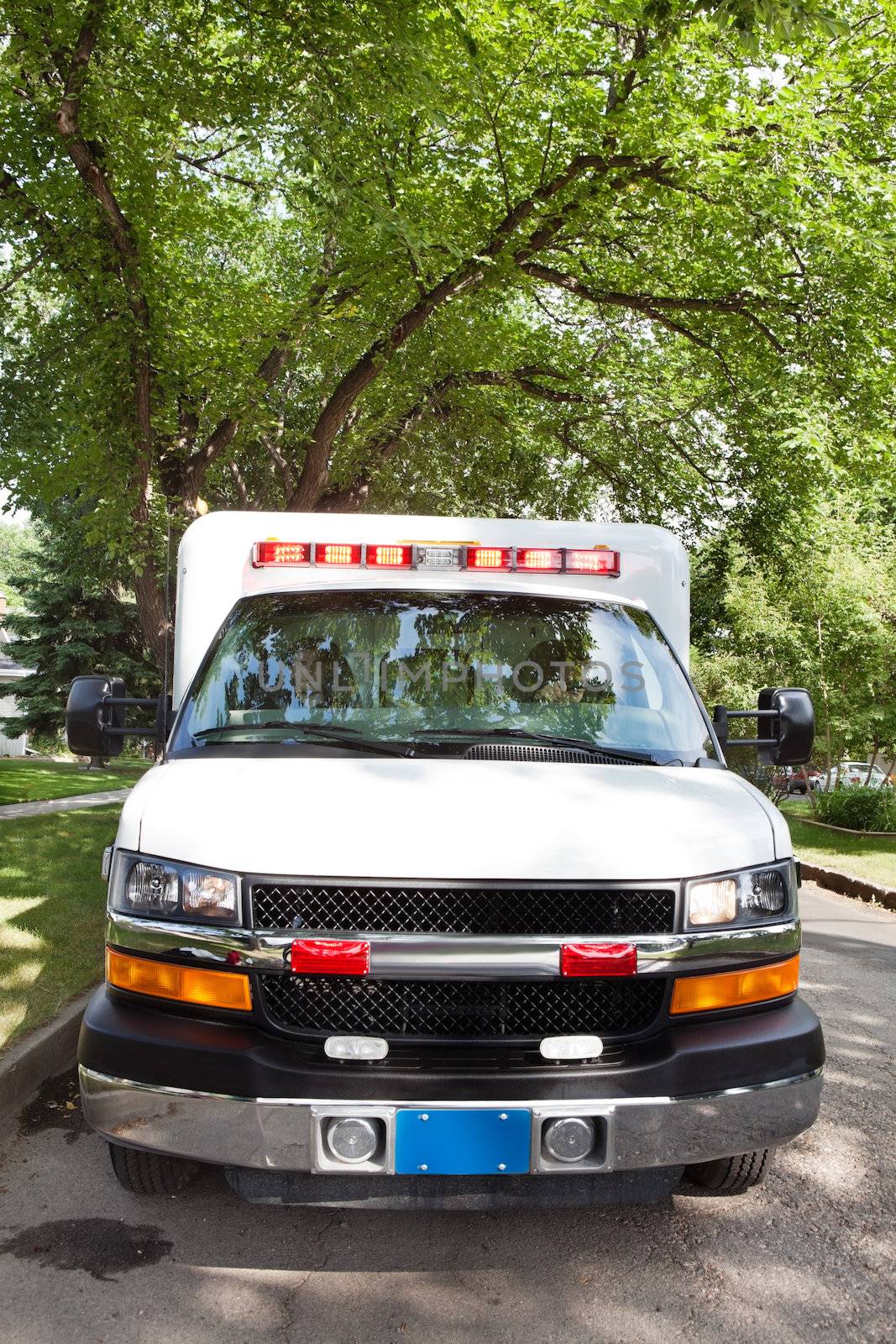 Ambulance on street in residential urban area