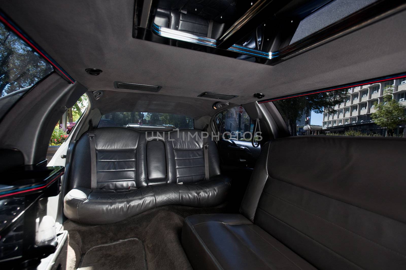 Detail shot of a limousine interior with black leather