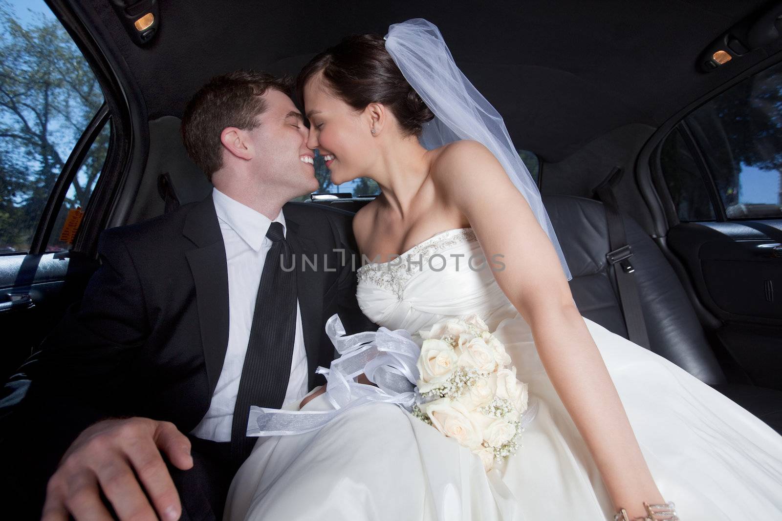 Newlywed Couple In Limousine by leaf