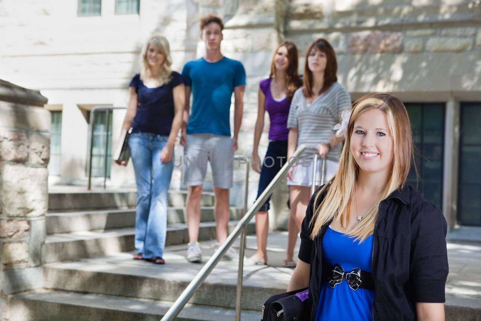 Students at college by leaf