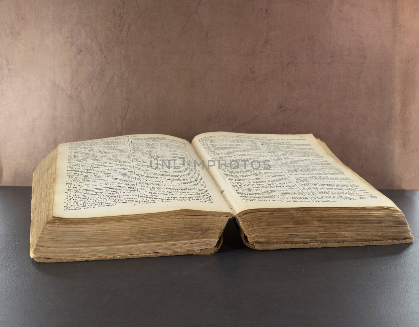 old bible book with brown background