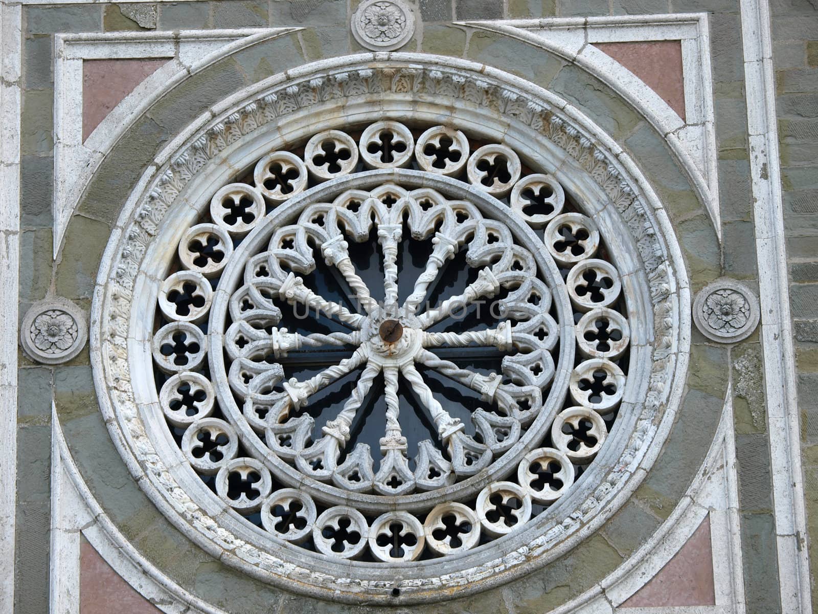 Rose window on the facade of the church of St. Margaret of Cortona