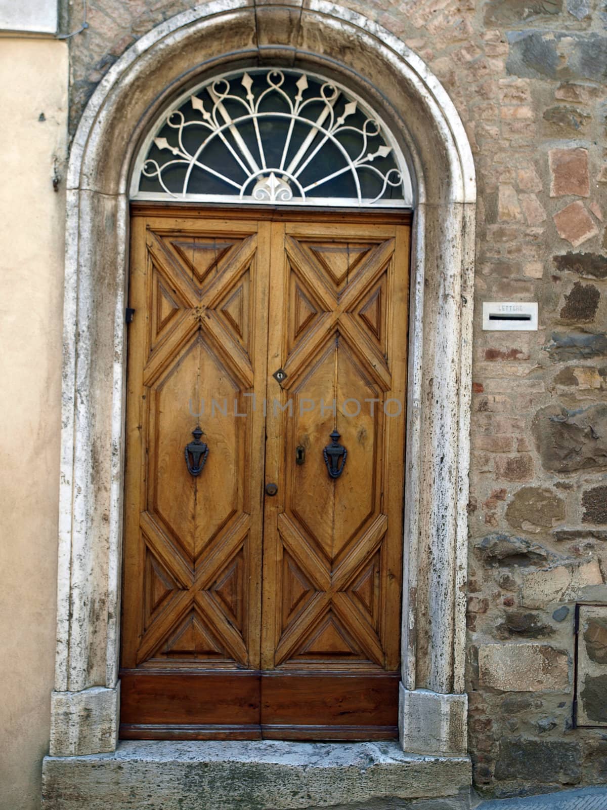 wooden residential doorway  in Tuscany. Italy