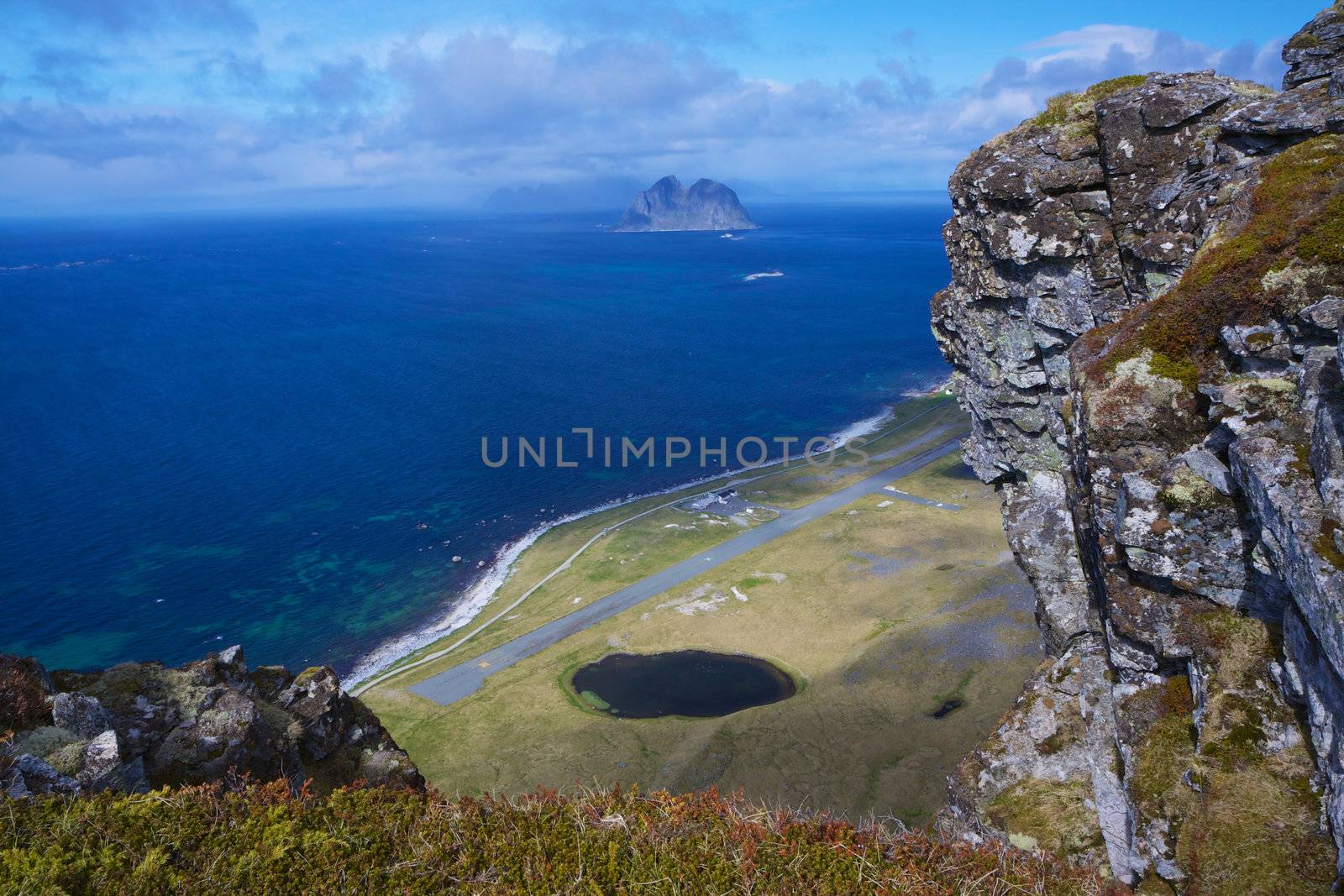 Scenic view of Lofoten islands in Norway from the top of cliffs on Vaeroy