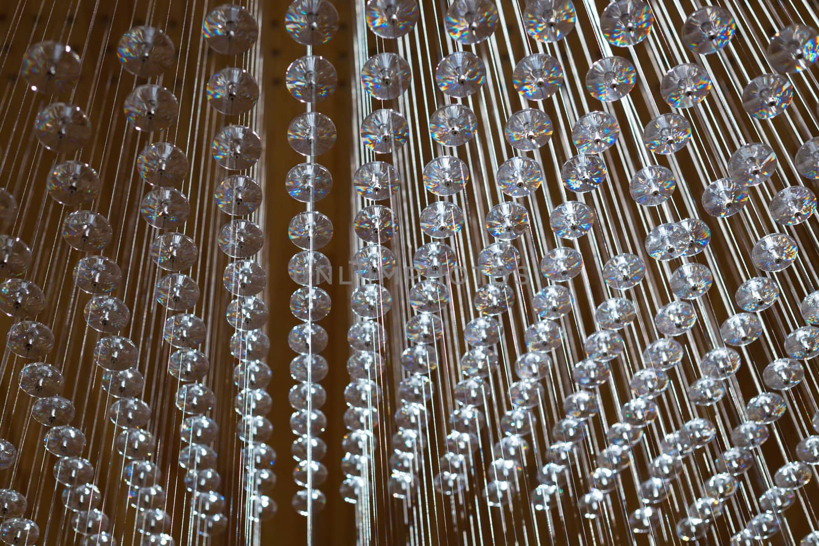 abstract strings and crystals arranged in geometric pattern