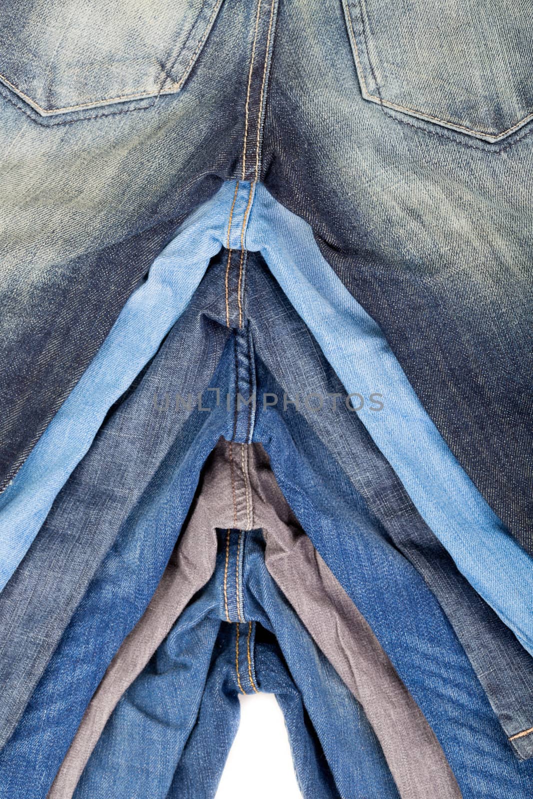 some jeans in different colors and sizes