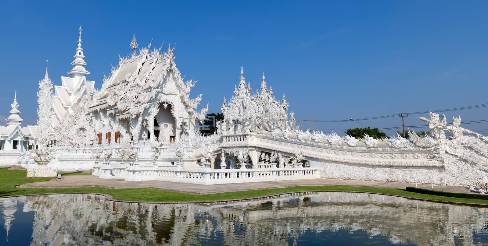 Panorama magnificently grand white temple, Rong Khun temple, Chiang Rai province, northern Thailand