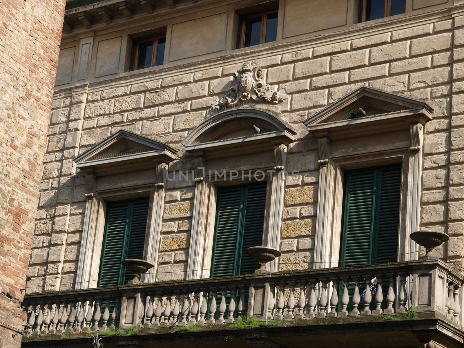 The facade of one of the buildings on the main street in Montepulciano