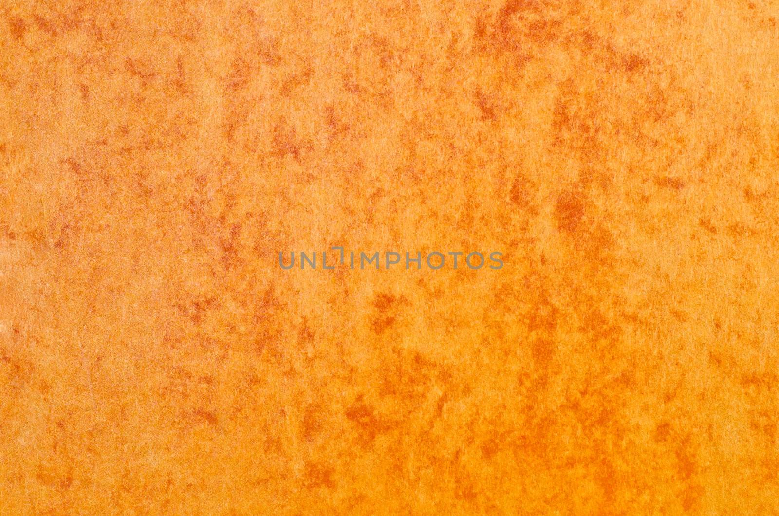 Orange paper texture background with red marble effect.
