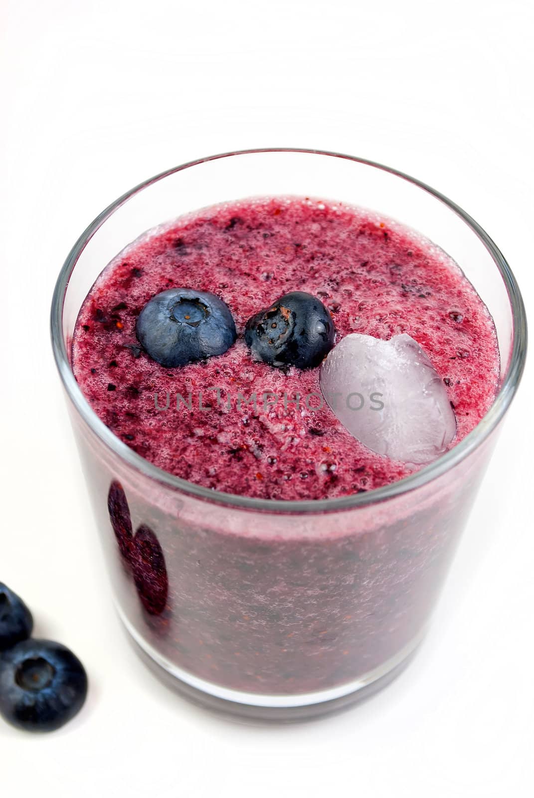 healthy blueberry smoothie isolated on white background