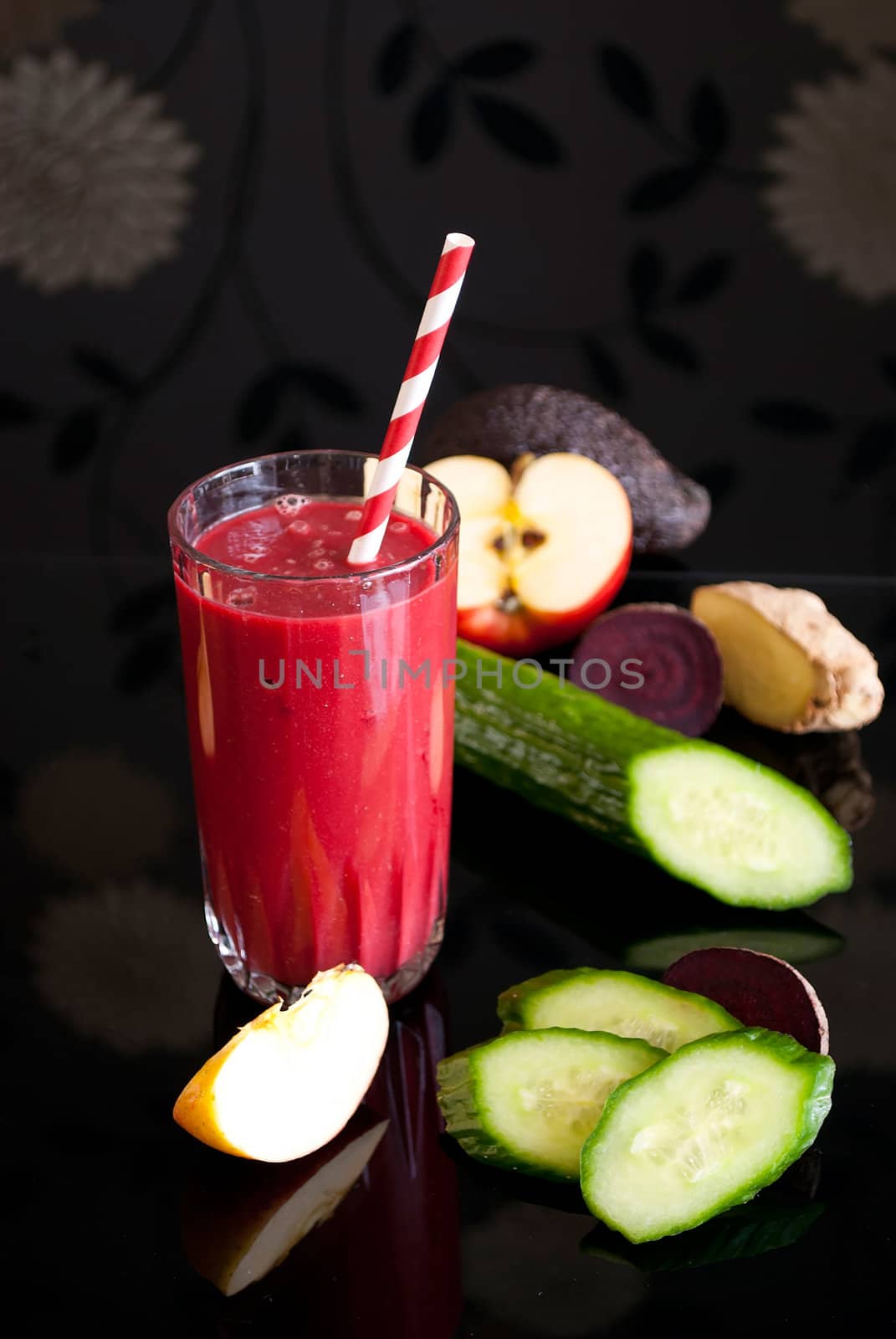 healthy juice made of variety fresh organic fruits and vegetables