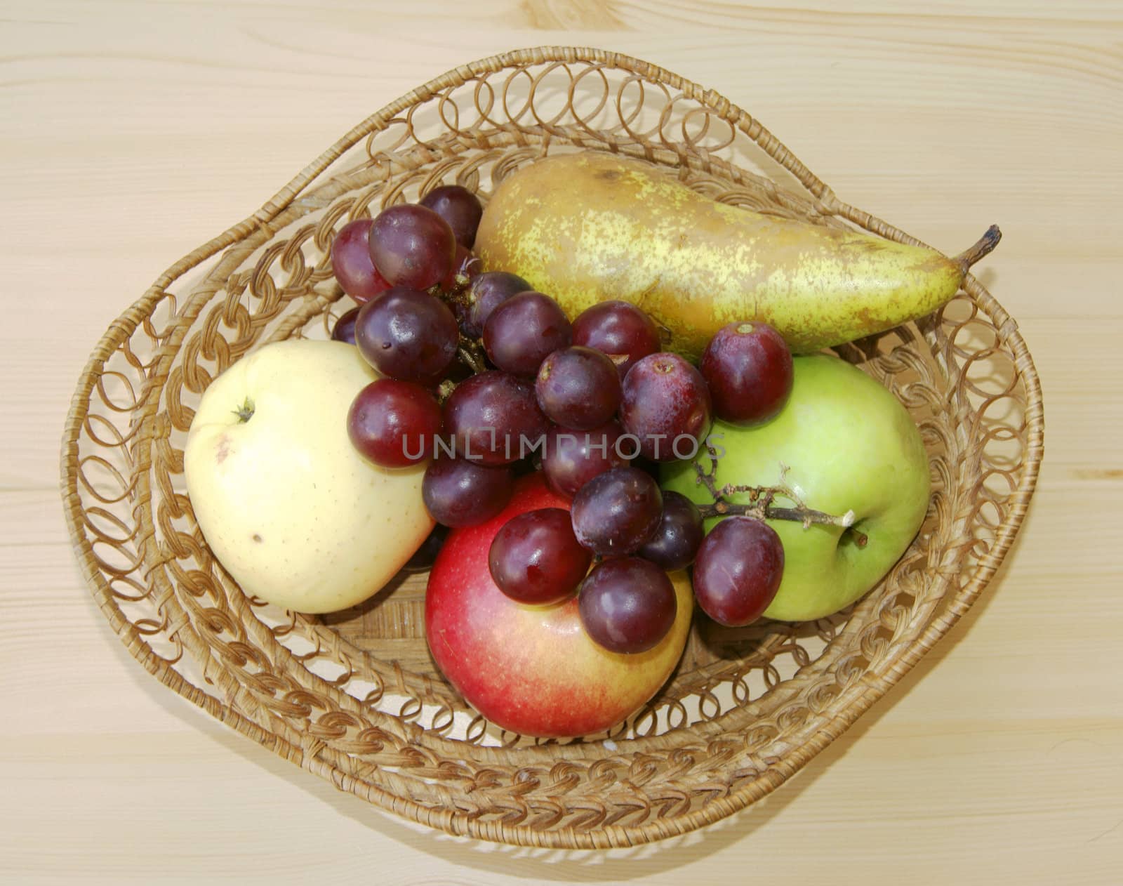 Braided basket with fresh fruit