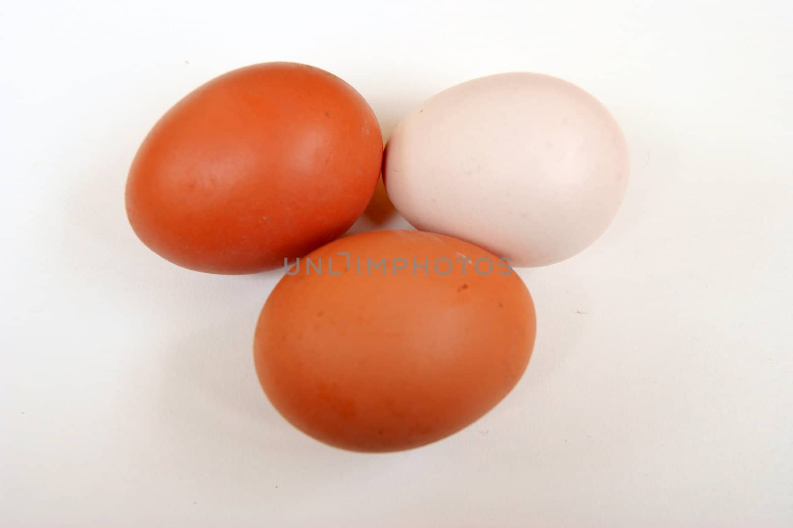 Three eggs on white background by cobol1964