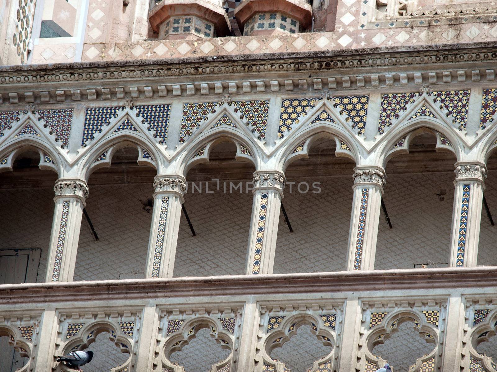 Detail of the facade of Orvieto Cathedral. (1290 - 1600 a. c.) Richly decorated with lots of stone mosaics