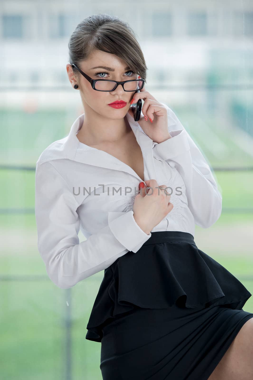 beautiful bussines woman with laptop and phone
