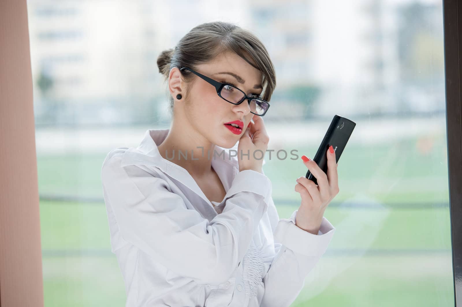 beautiful bussines woman with laptop and phone