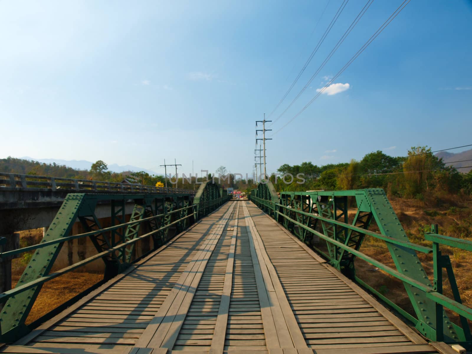 Historical bridge over the pai river in Mae hong son, Thailand by gururugu