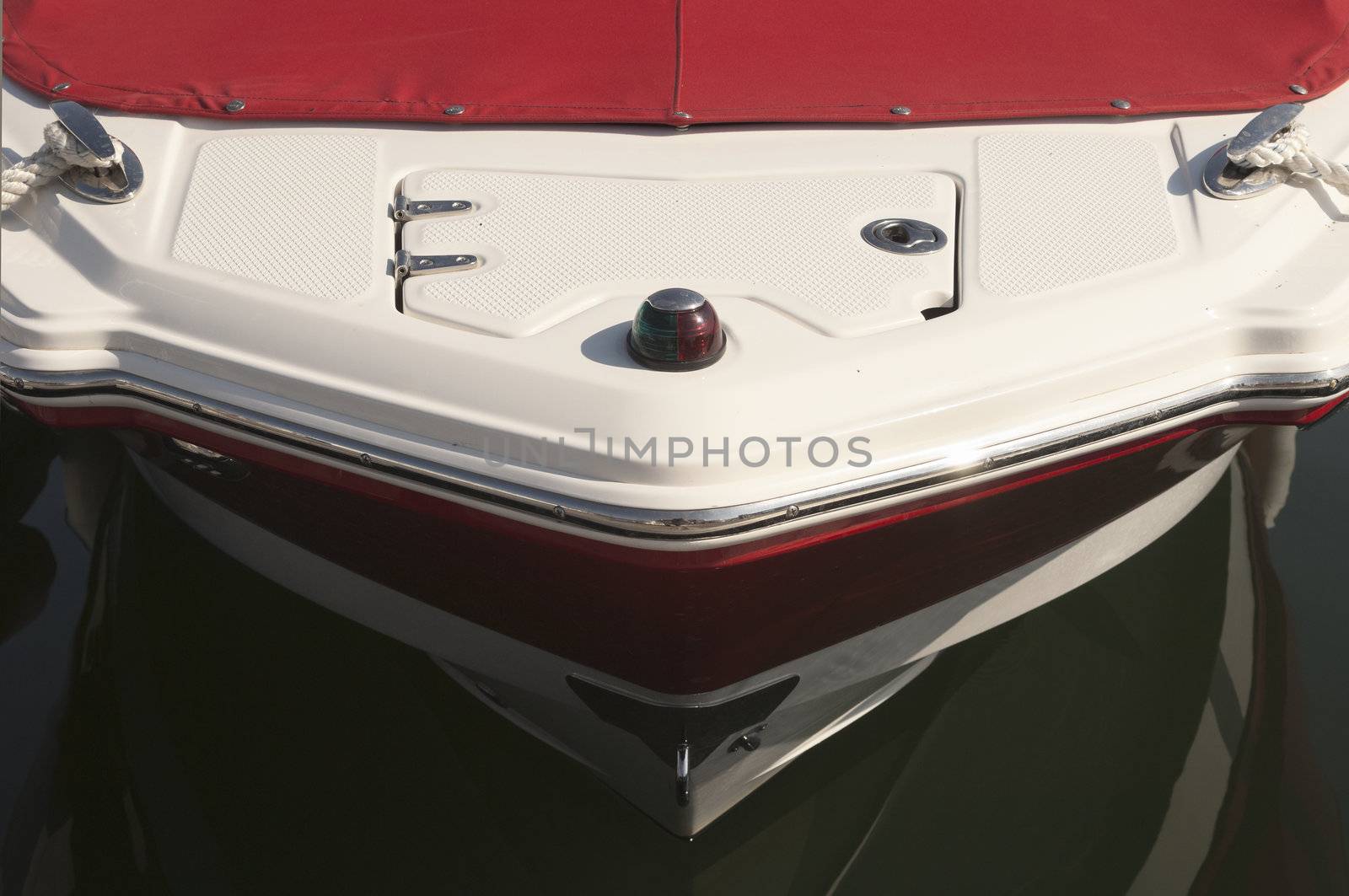 Detail of a red and white boat prow