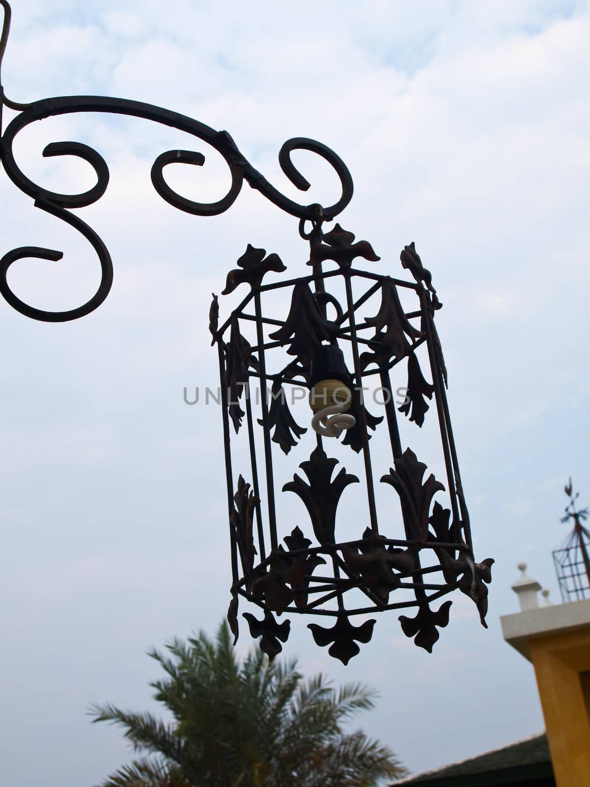 Antique bronze lantern in nature by gururugu
