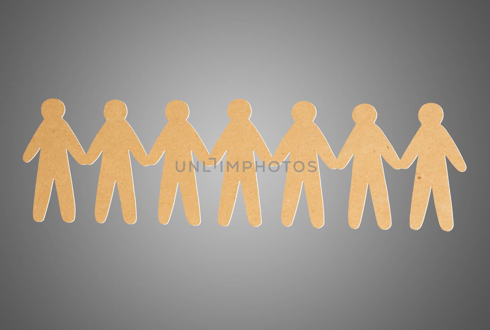 team of paper people on grey background