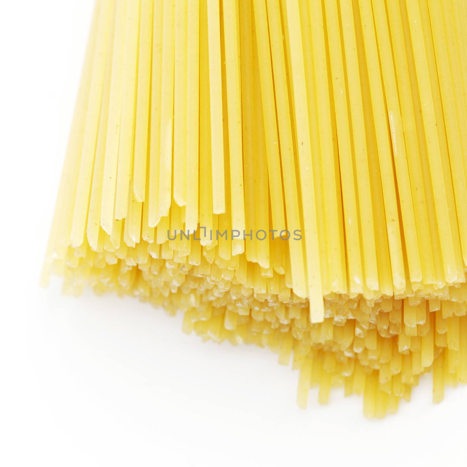 Dry spaghetti isolated on white background
