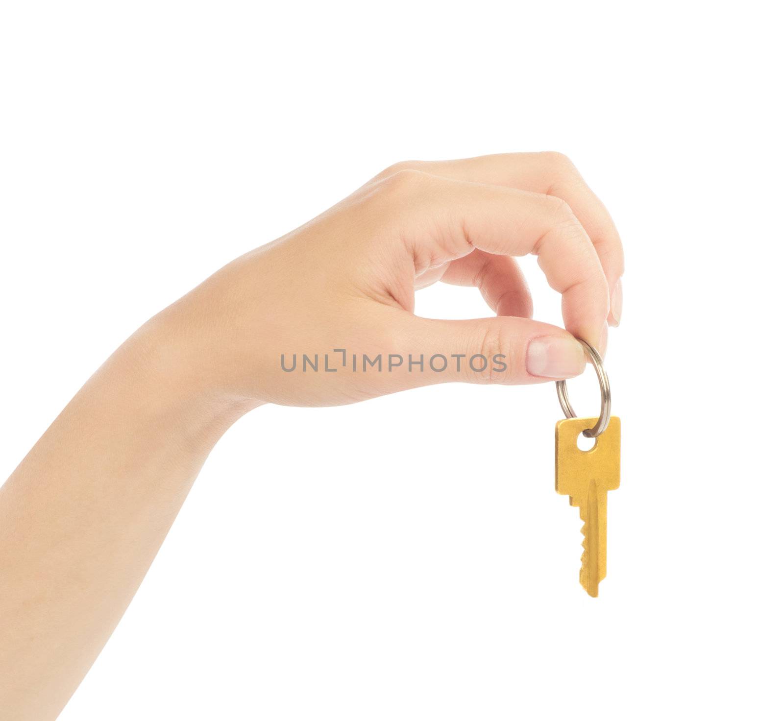 hand holds a gold key