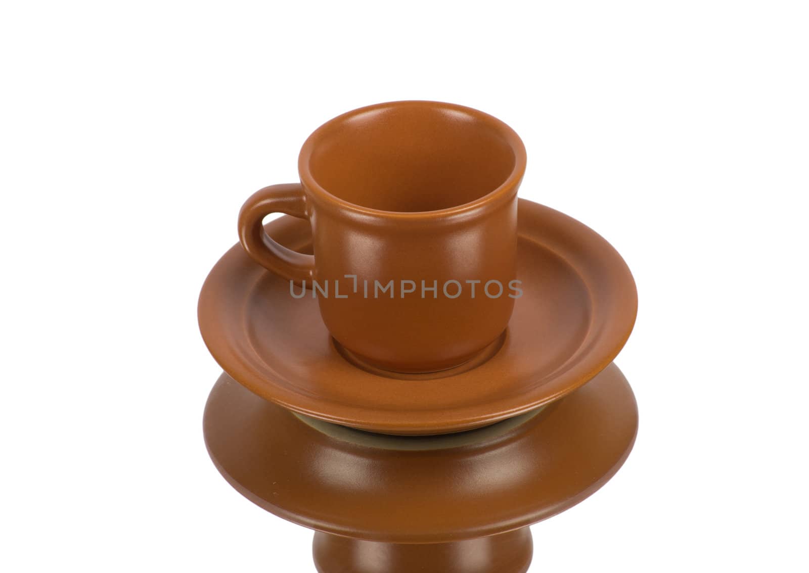Brown cup on the white background