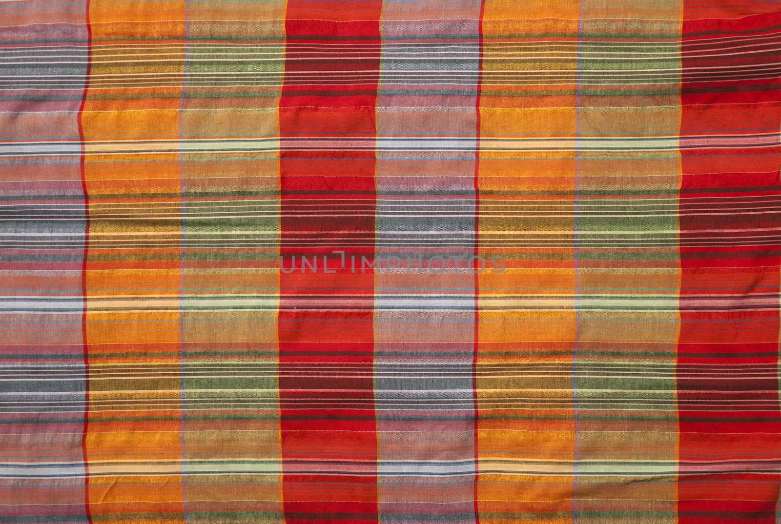 Close-up of multicoloured fabric with geometric pattern
