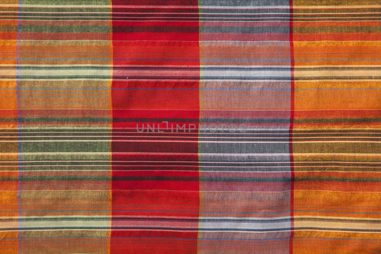 Close-up of multicoloured fabric with geometric pattern