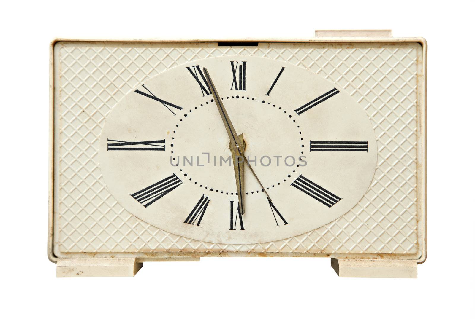 Old alarm clock isolated over white background