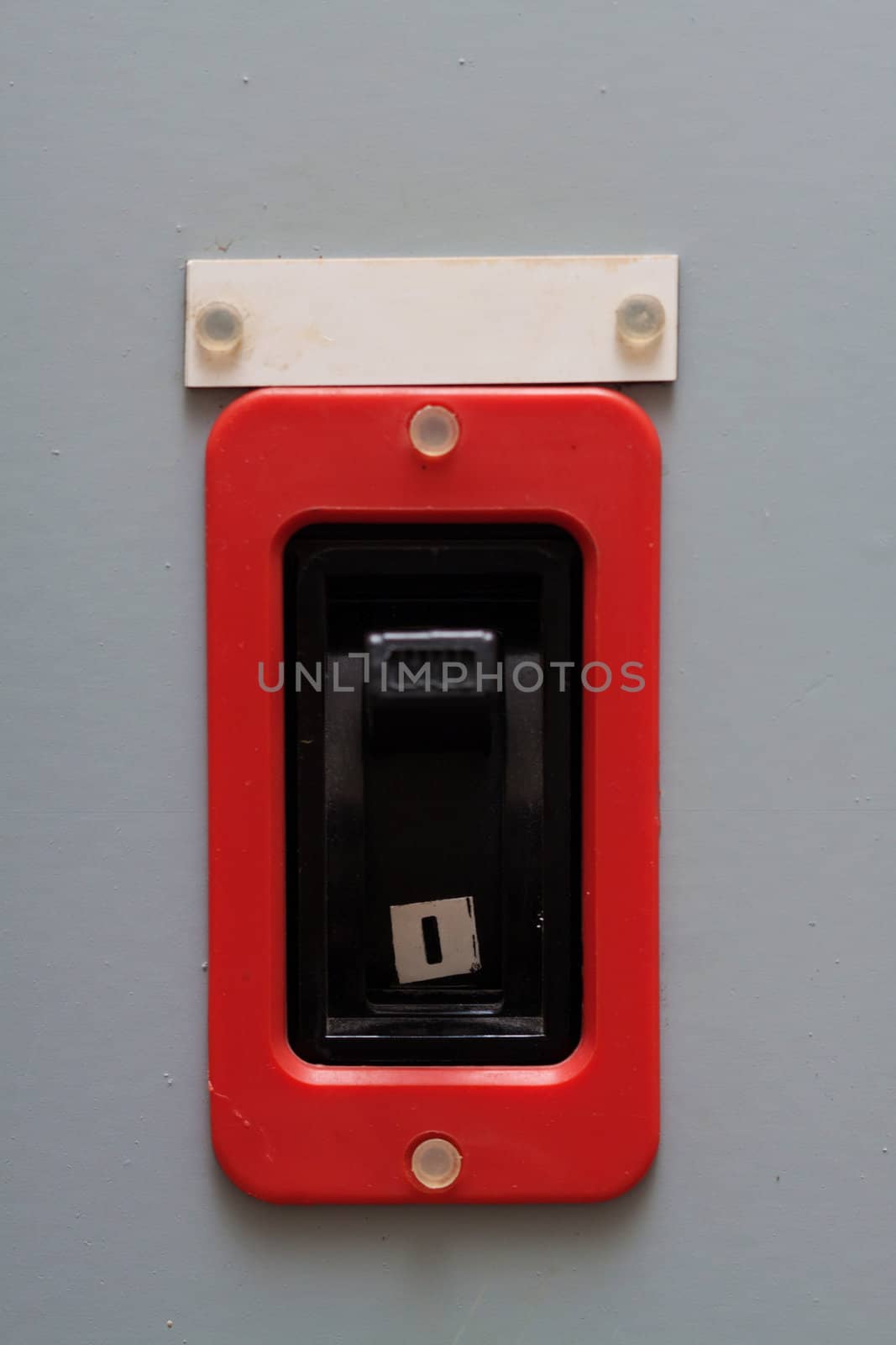Industrial circuit breaker with a warning sign