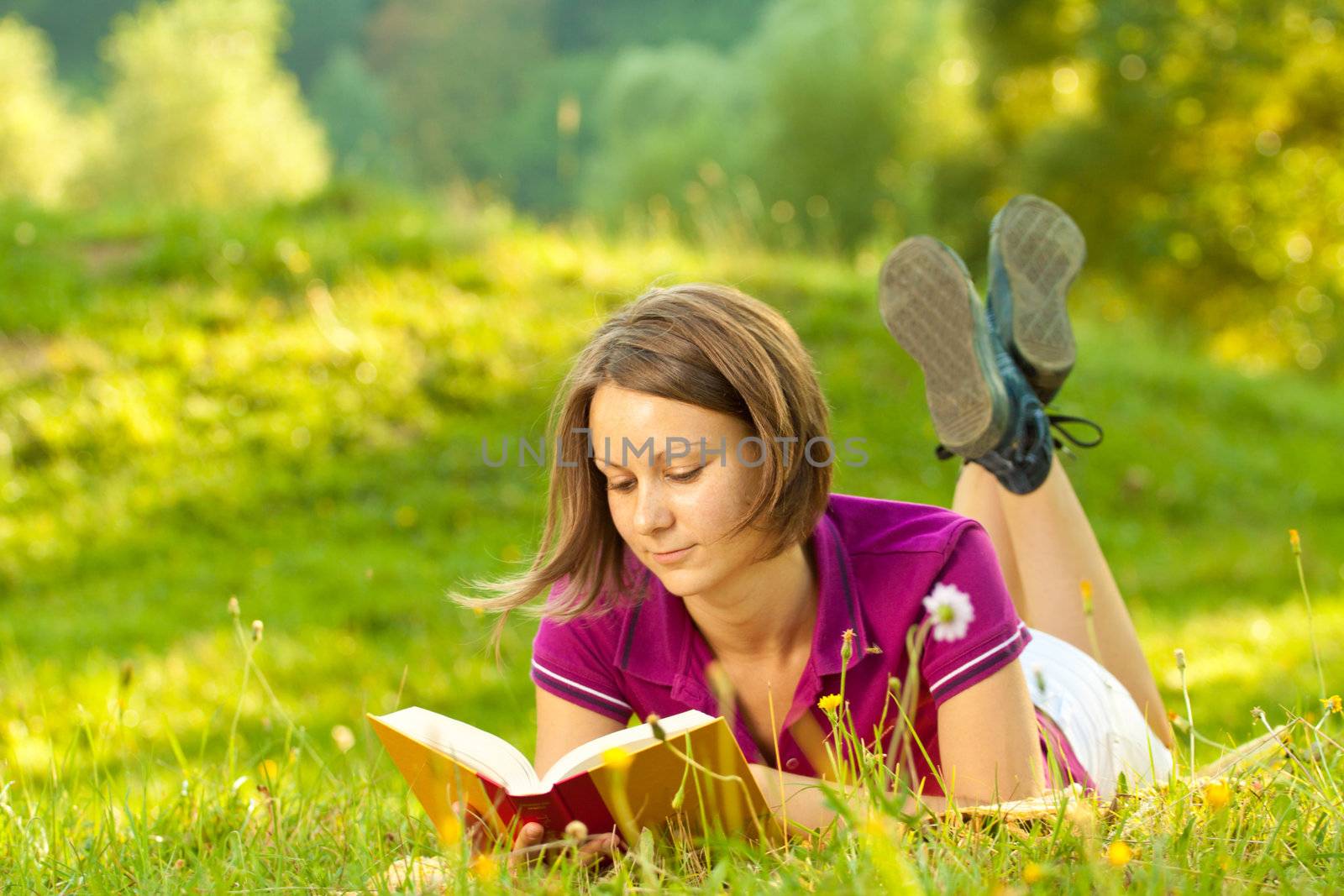 Beautiful woman enjoying a book