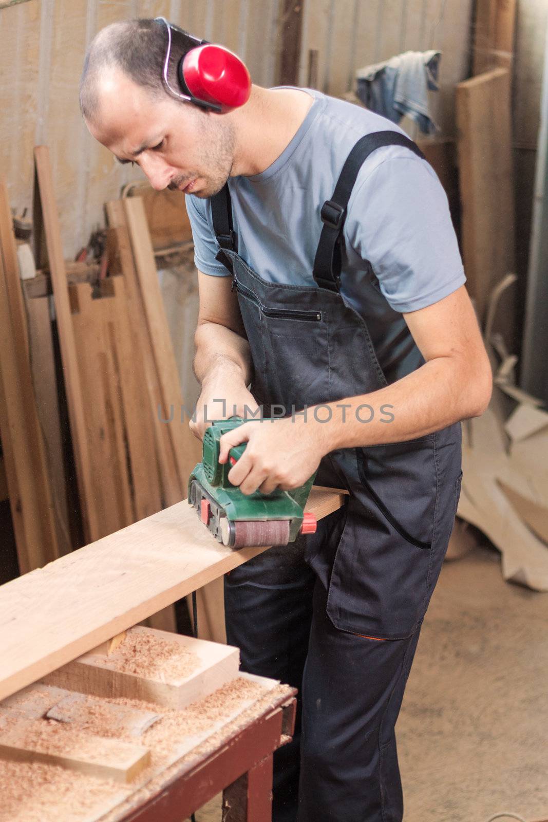 Carpenter with power grinder