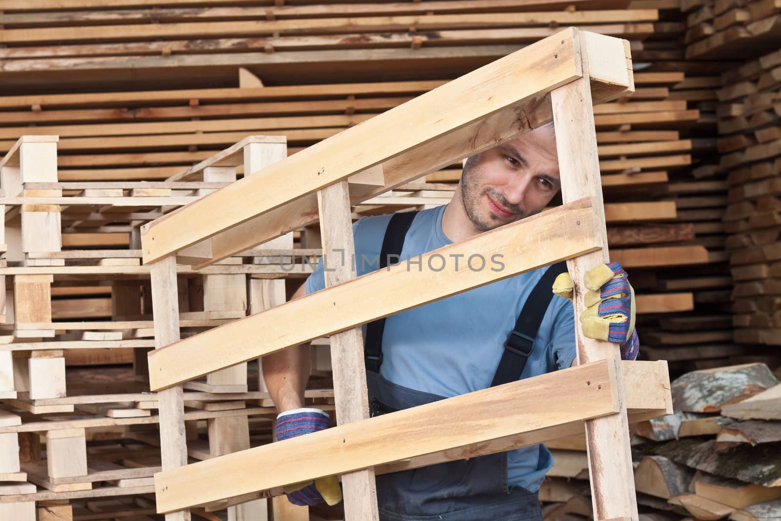 Man moving wood pallets by Lamarinx
