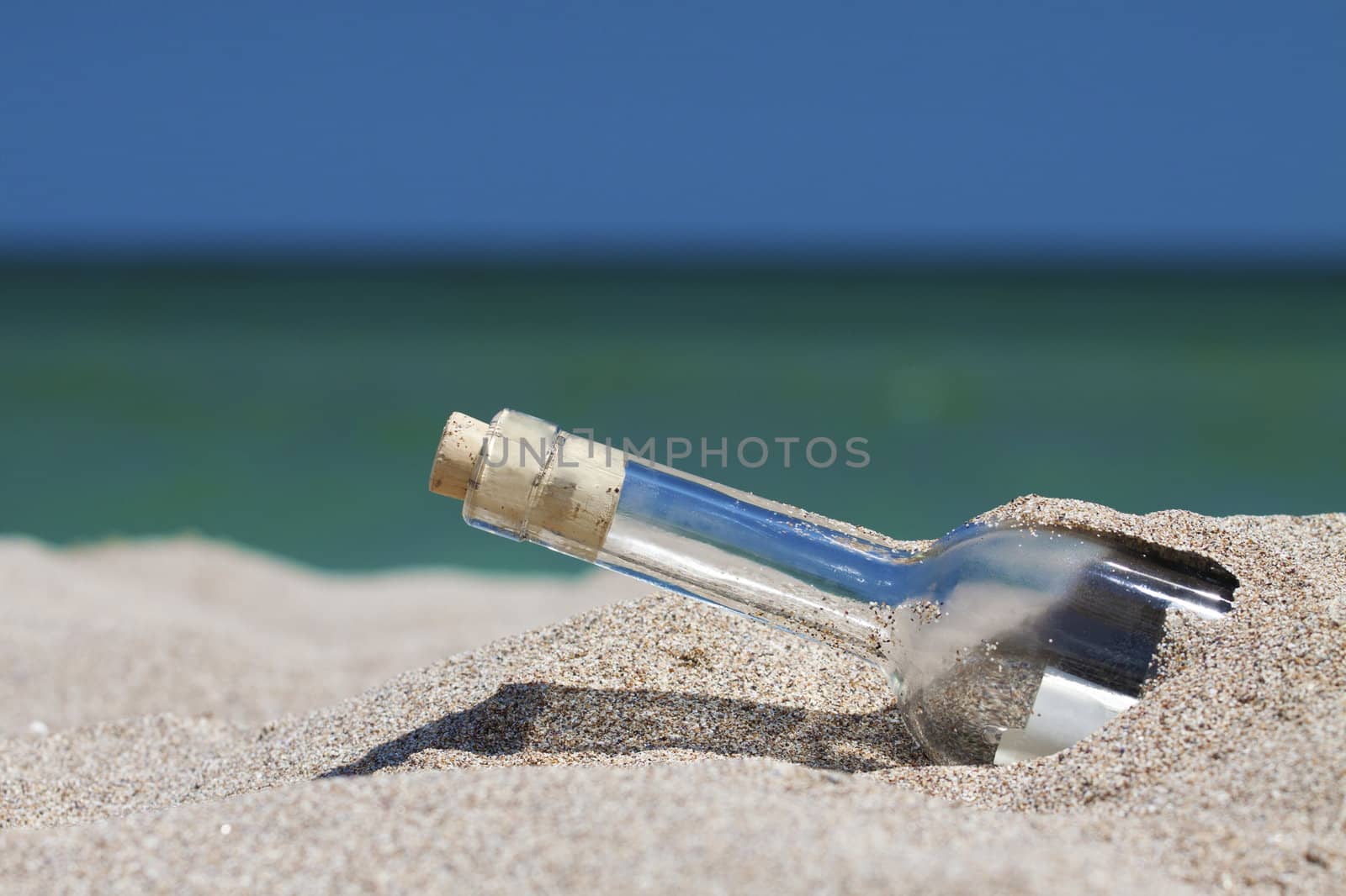 Message in a bottle with sea and the horizon by Lamarinx