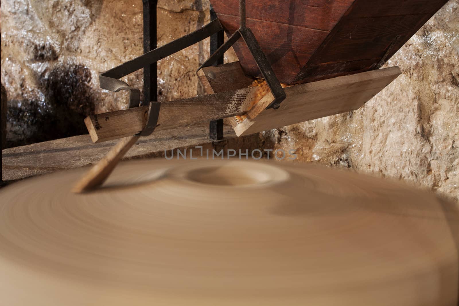 Ancient water mill with corn.